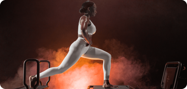 Woman exercising on a fitness platform